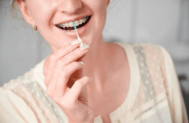 Brushing and Flossing with Braces